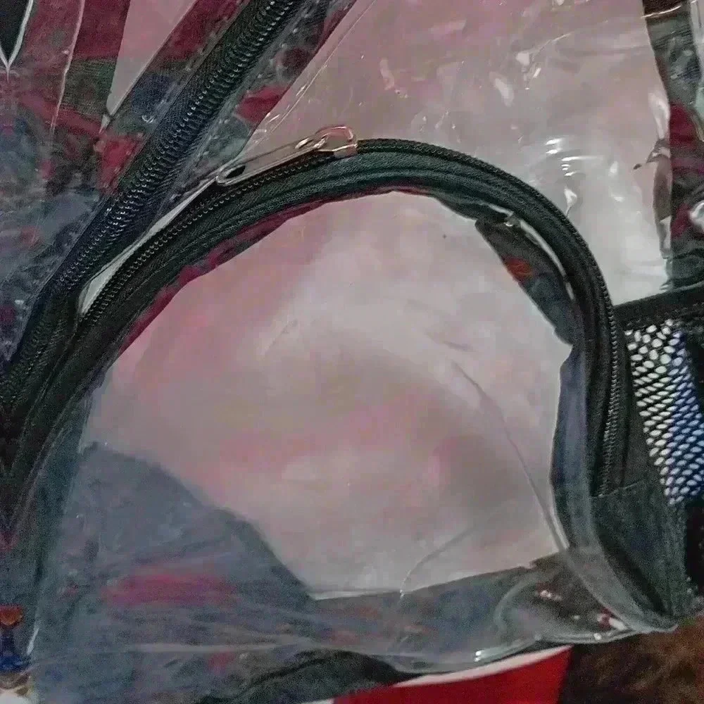 Clear triangle shaped sling bag‎
